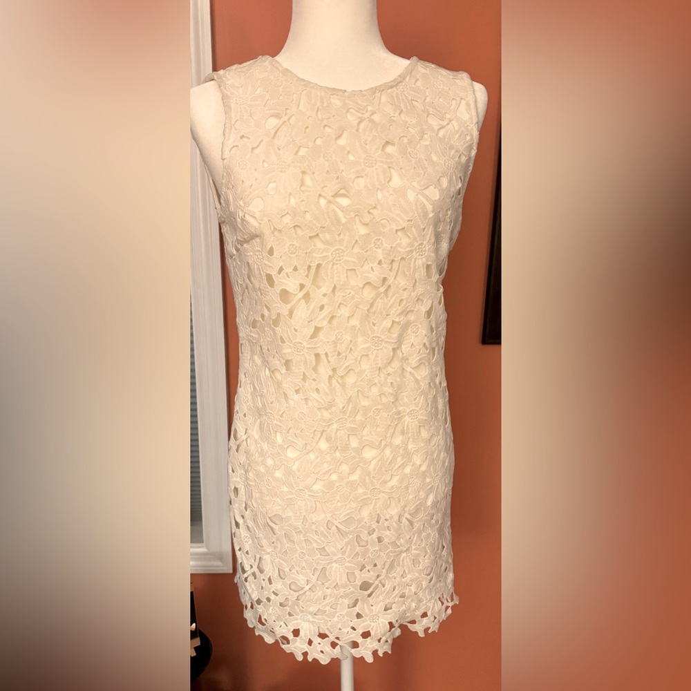 Beautiful white dress with flower overlay